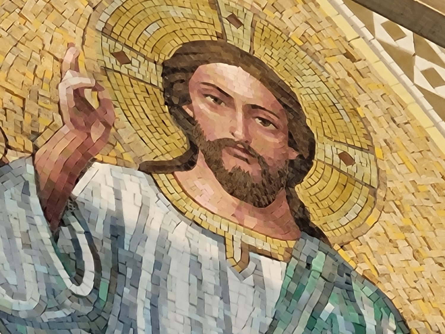 This mosaic image, titled “Christ, Ruler of All” adorns the space above the main entrance of the Cathedral of St. Joseph. It is made up of hundreds of intricately hand-cut pieces of stone and glass.